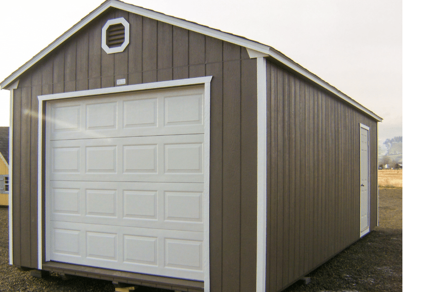 Garage on lot white door brown siding