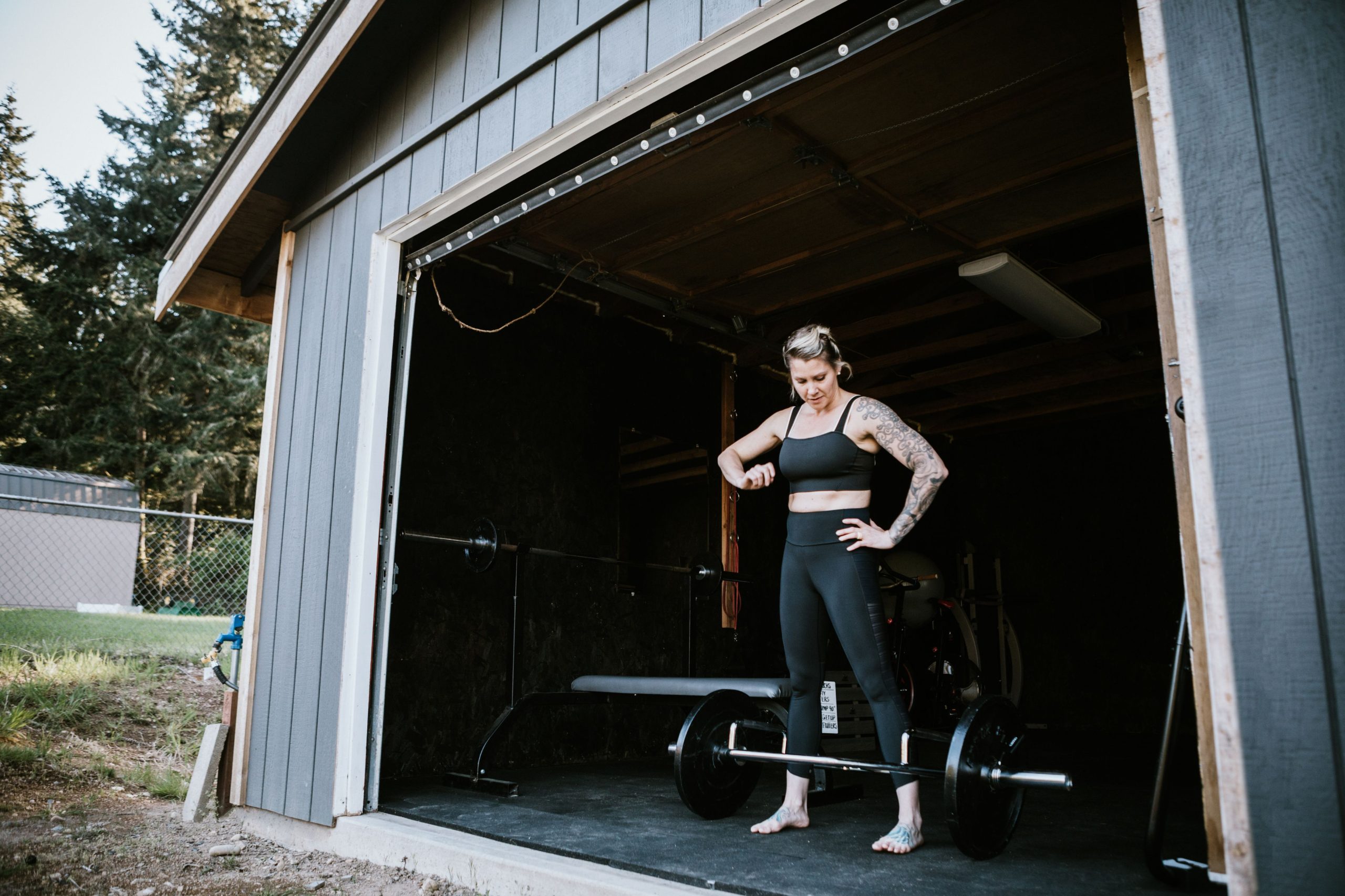 Woman Working Out In Garage