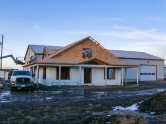 new office roof top and construction with shed shop in the background